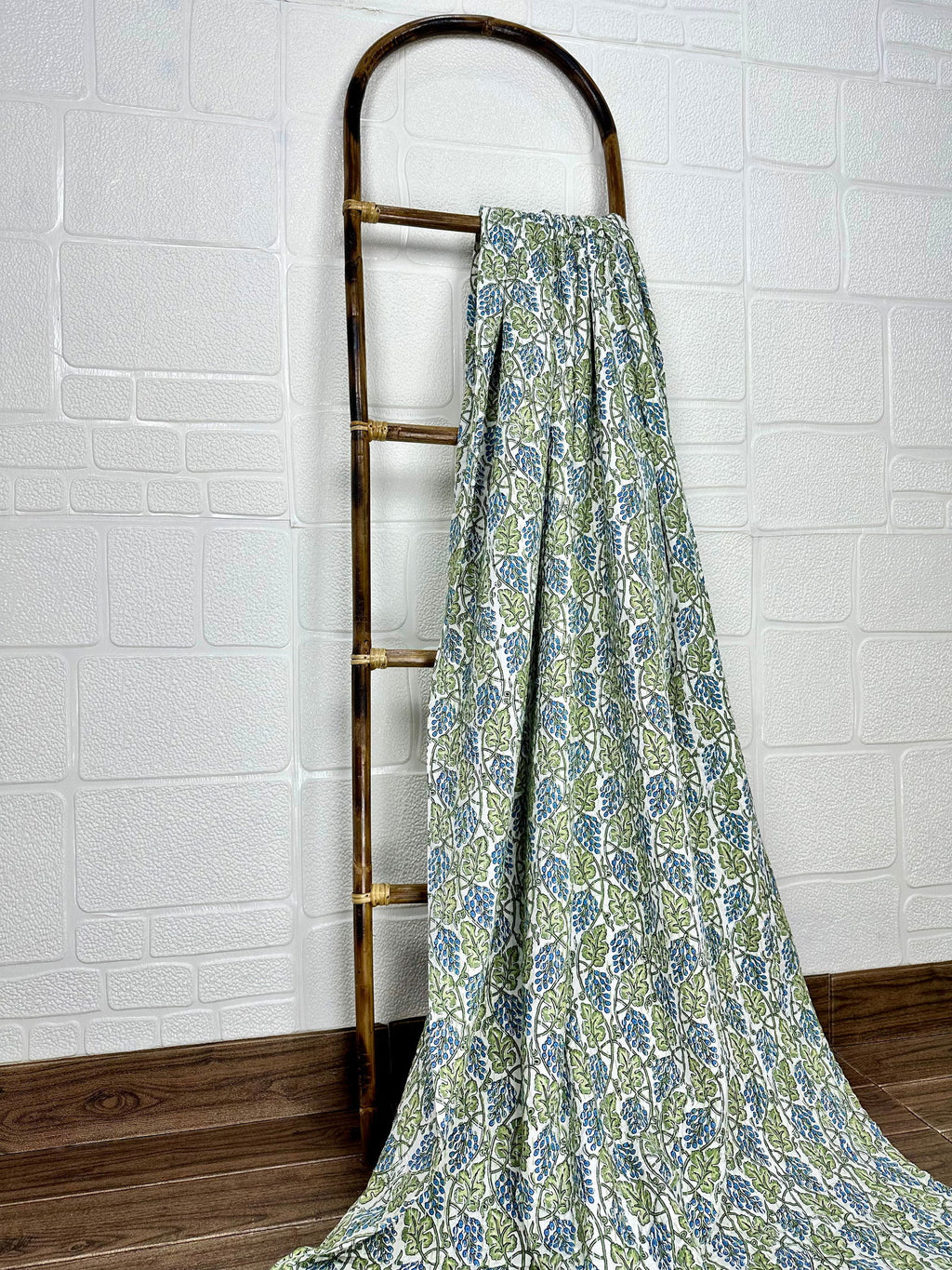 reversible Kantha-stitched block-printed Cotton Throw in white green leaf